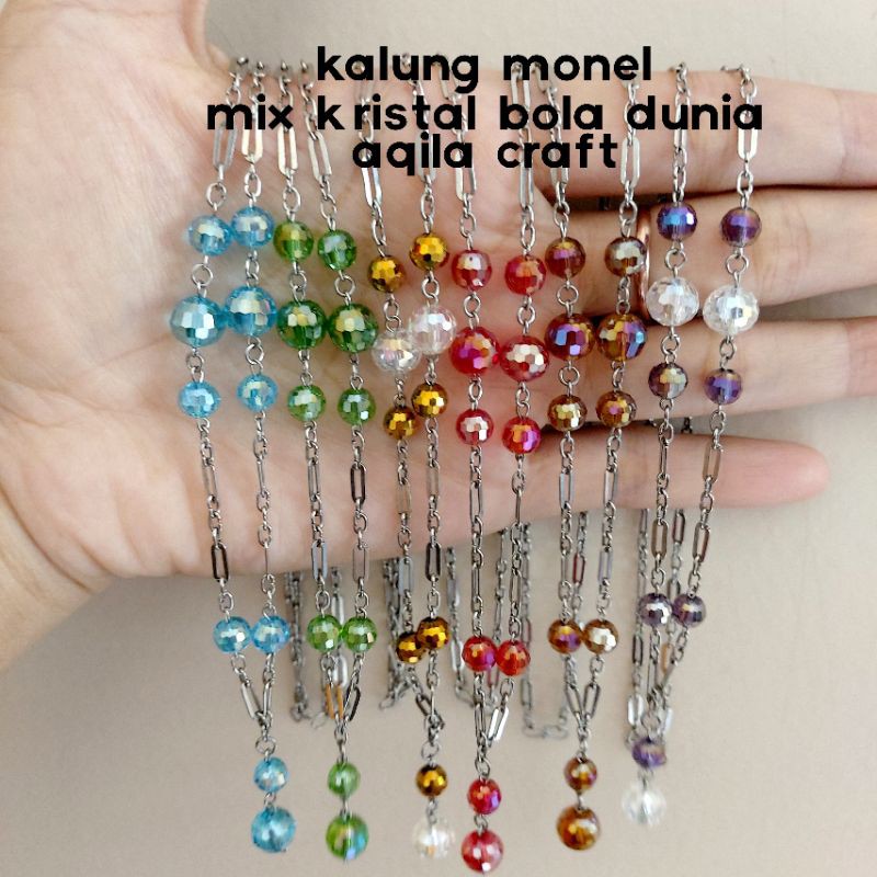 KALUNG MONEL KRISTAL BOLA DUNIA