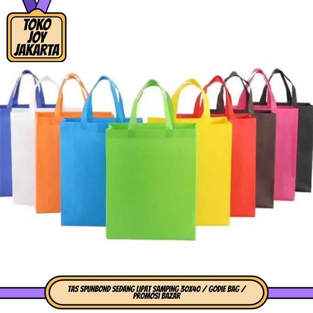 

Tas Spunbond SEDANG Lipat Samping 30x40 / Godie Bag / Promosi Bazar