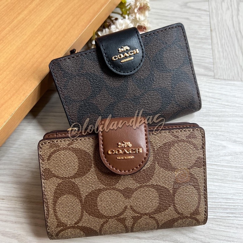 dompet coach medium