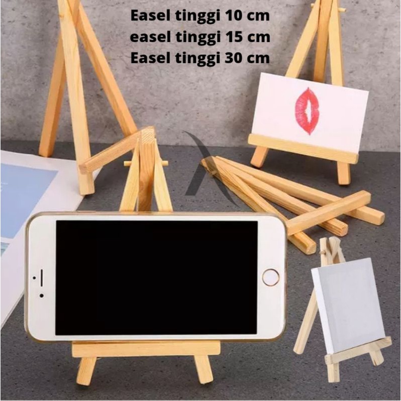 

Easel Stand Tripod Kayu Wooden Easel Holder Mini Tinggi 10 Cm Sd 30 Cm Sandaran Hp dan Kanvas