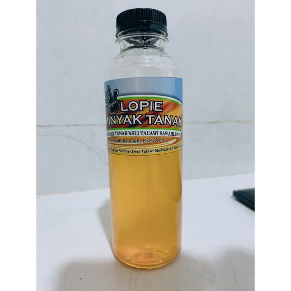 

Minyak Tanak kemasan 1/4 liter / minyak kelapa murni 100% (asli dari desa Talawi)