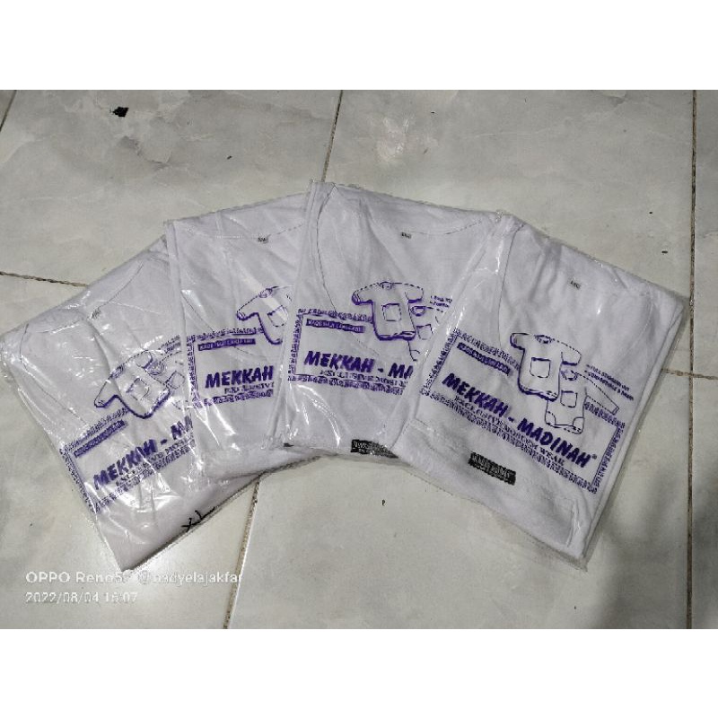 kaos haji kantong depan
