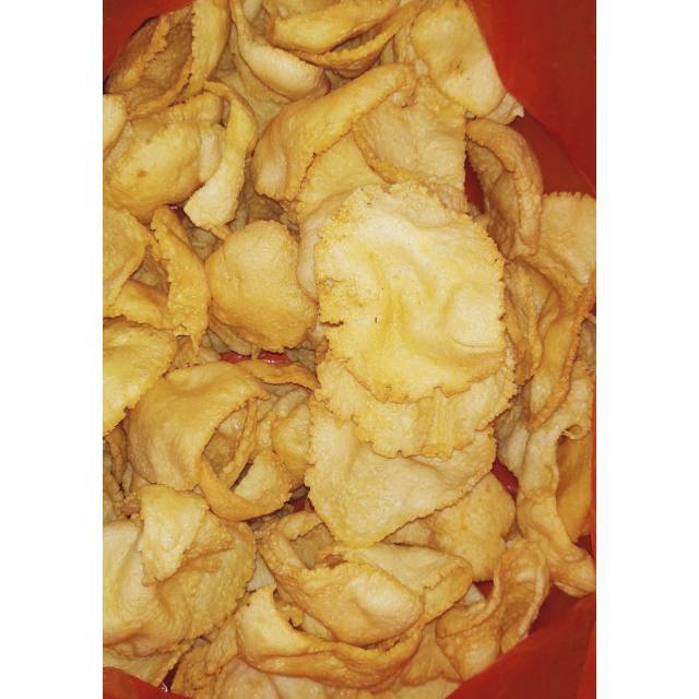 

Krupuk bawang mentah 750gram (foto hasil setelah goreng)