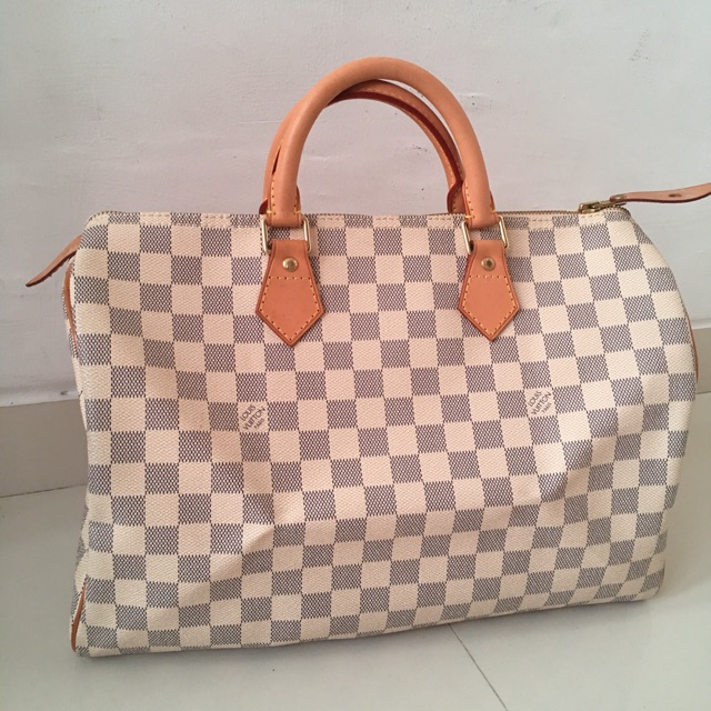 Used twice LV Speedy monogram azur 35  2009