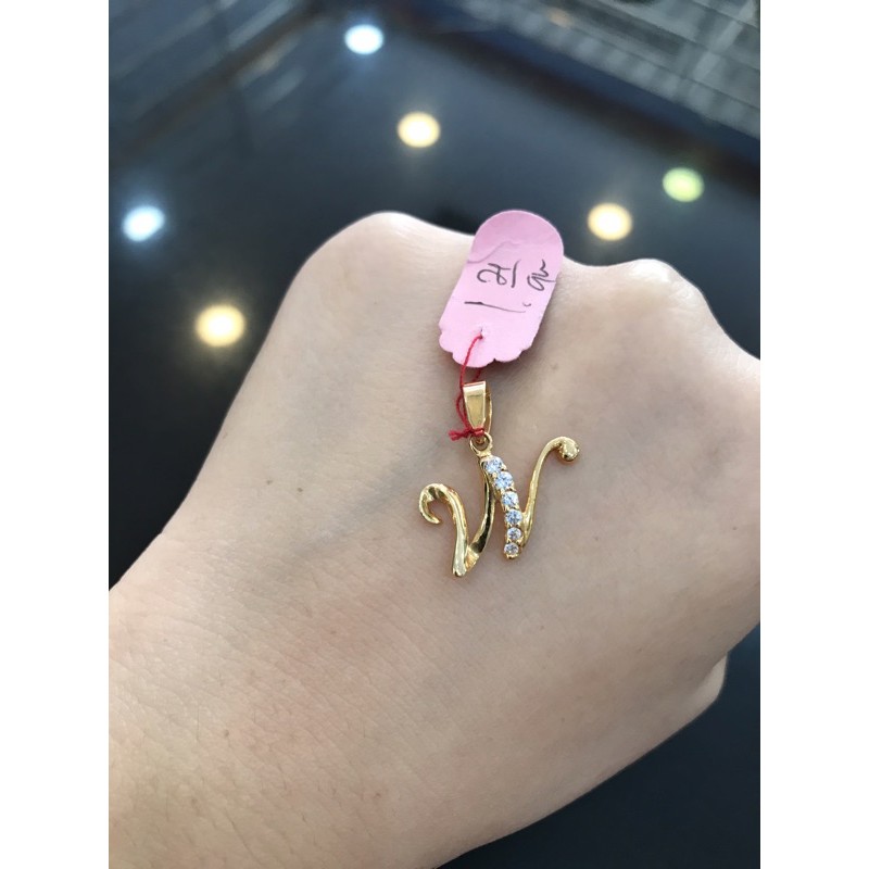 Liontin W emas asli kadar 700