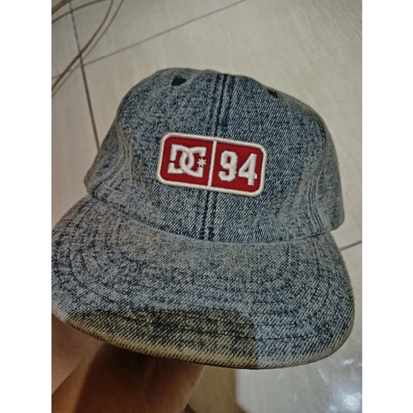 topi dc original