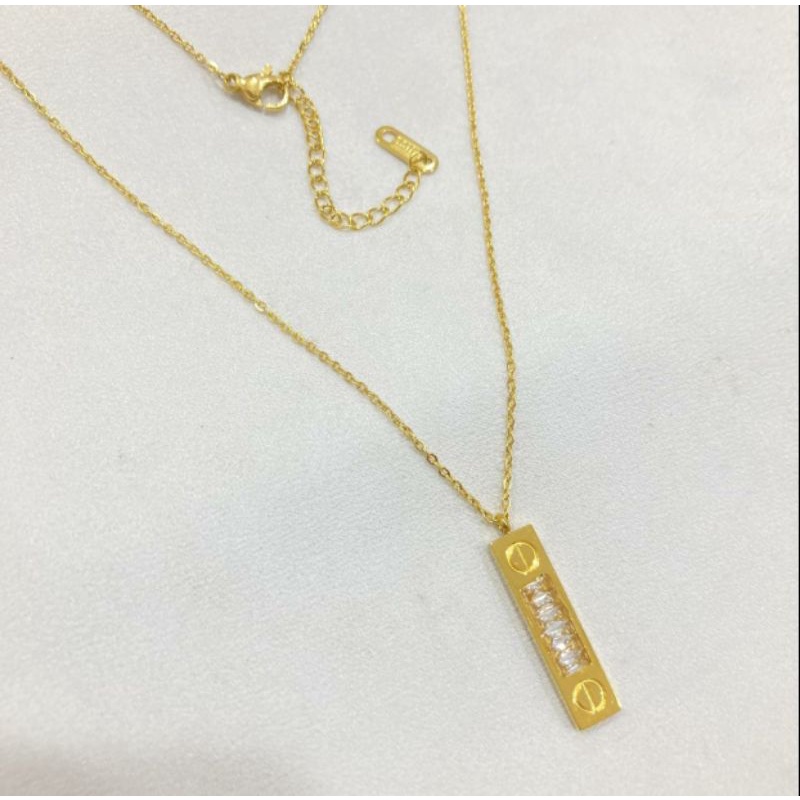 Kalung Plat Permata Putih Titanium Gold N03082103