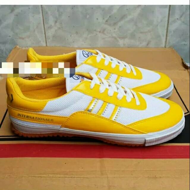  SEPATU  KODACHI 8115 PUTIH KUNING PUTIH LIST KUNING sold 