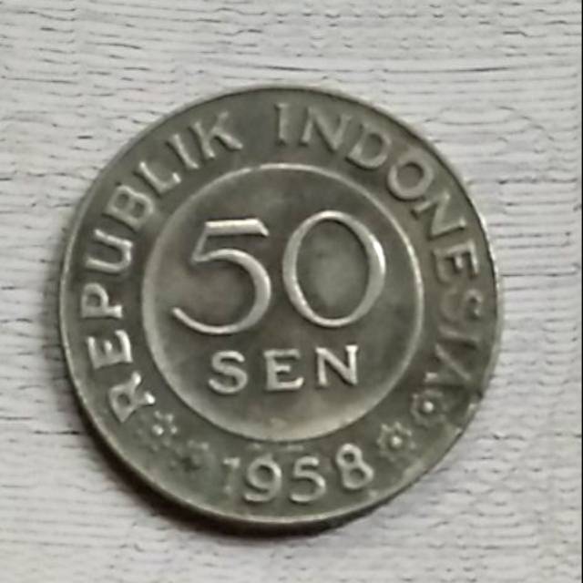 Uang  50 SEN TH 1958 unik