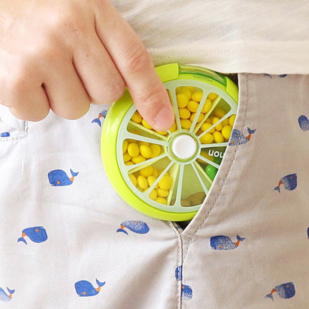 Kotak Penyimpanan Pil Obat Mingguan 7 Kompartemen Bentuk Buah Model Putar 3x Untuk Travel