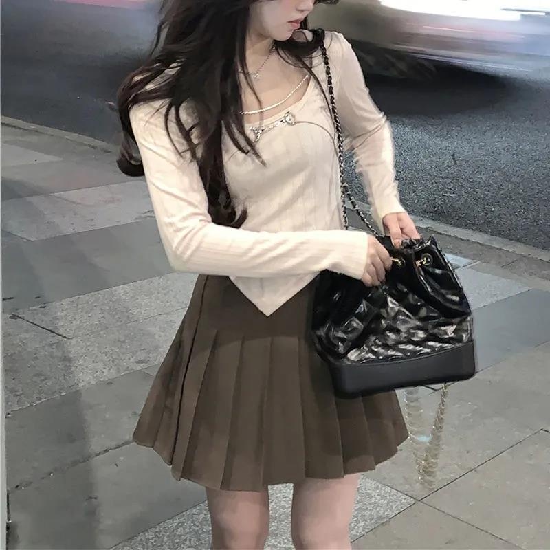Suhao Musim Semi dan Musim Gugur Pure Fashion Dressing Small Fashion Gaya Barat Palsu Dua-piece Pendek Top Wanita Kulit Penutup Rantai T-Shirt Lengan Panjang