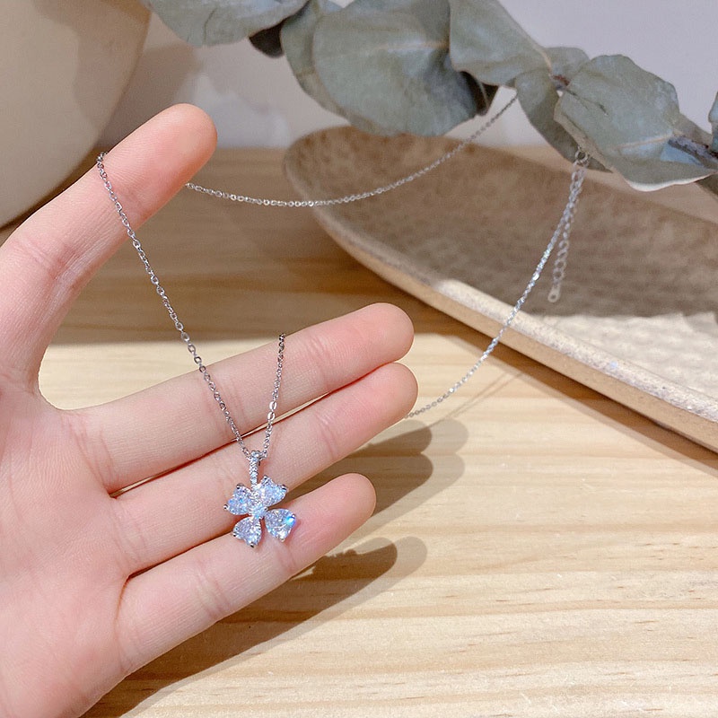 Kalung Choker Desain Bunga Bahan Zircon Titanium Warna Silver