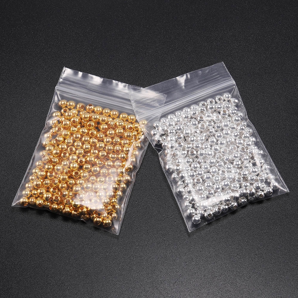 100pcs / Lot Manik-Manik Spacer Bulat 3 / 4 / 5 / 6mm Warna Gold / Silver Untuk Membuat Perhiasan