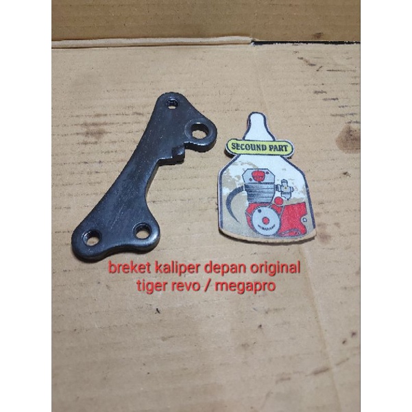 breket kaliper depan tiger revo megapro original