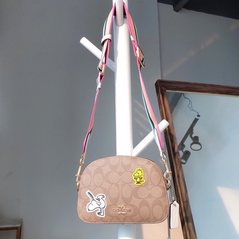 TAS WANITA WOMEN CH X PEANUTS MINI SERENA SATCHEL IN SIGNATURE CANVAS  WITH VARSITY PATCHES C4238