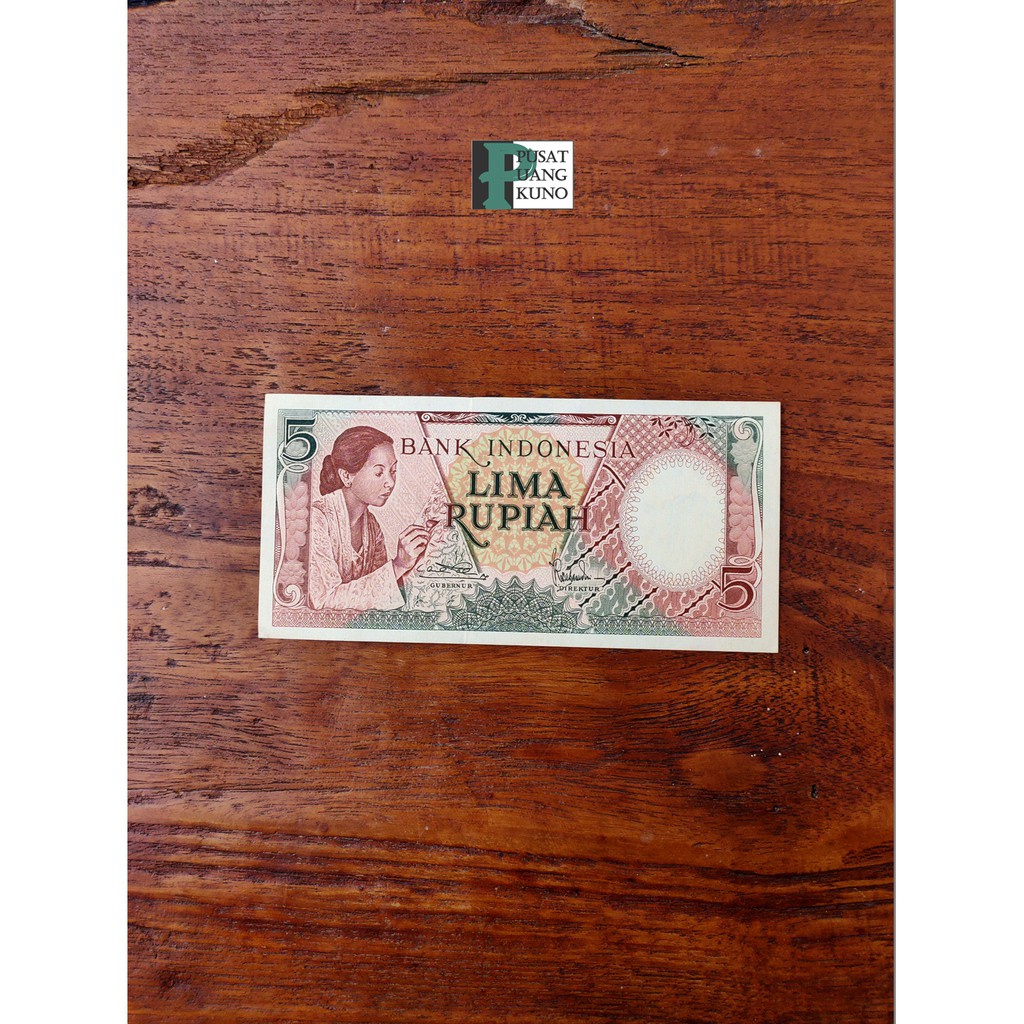 

Uang kertas 5 rupiah tahun 1958 pembantik wanita