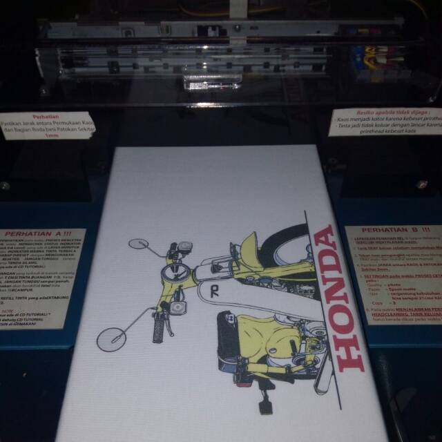 Jasa print cetak sablon kaos dtg