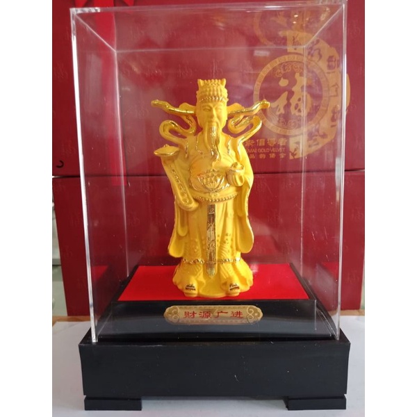 Patung emas dewa rezeki