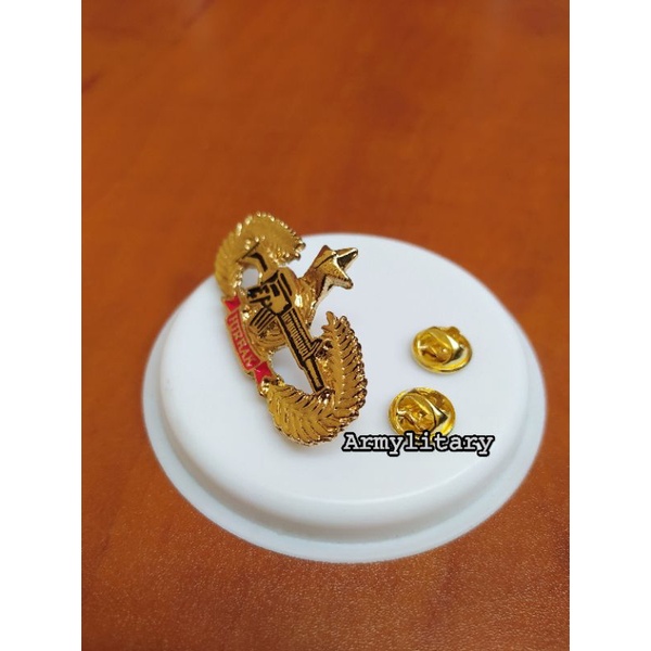 Pin hirbak 1