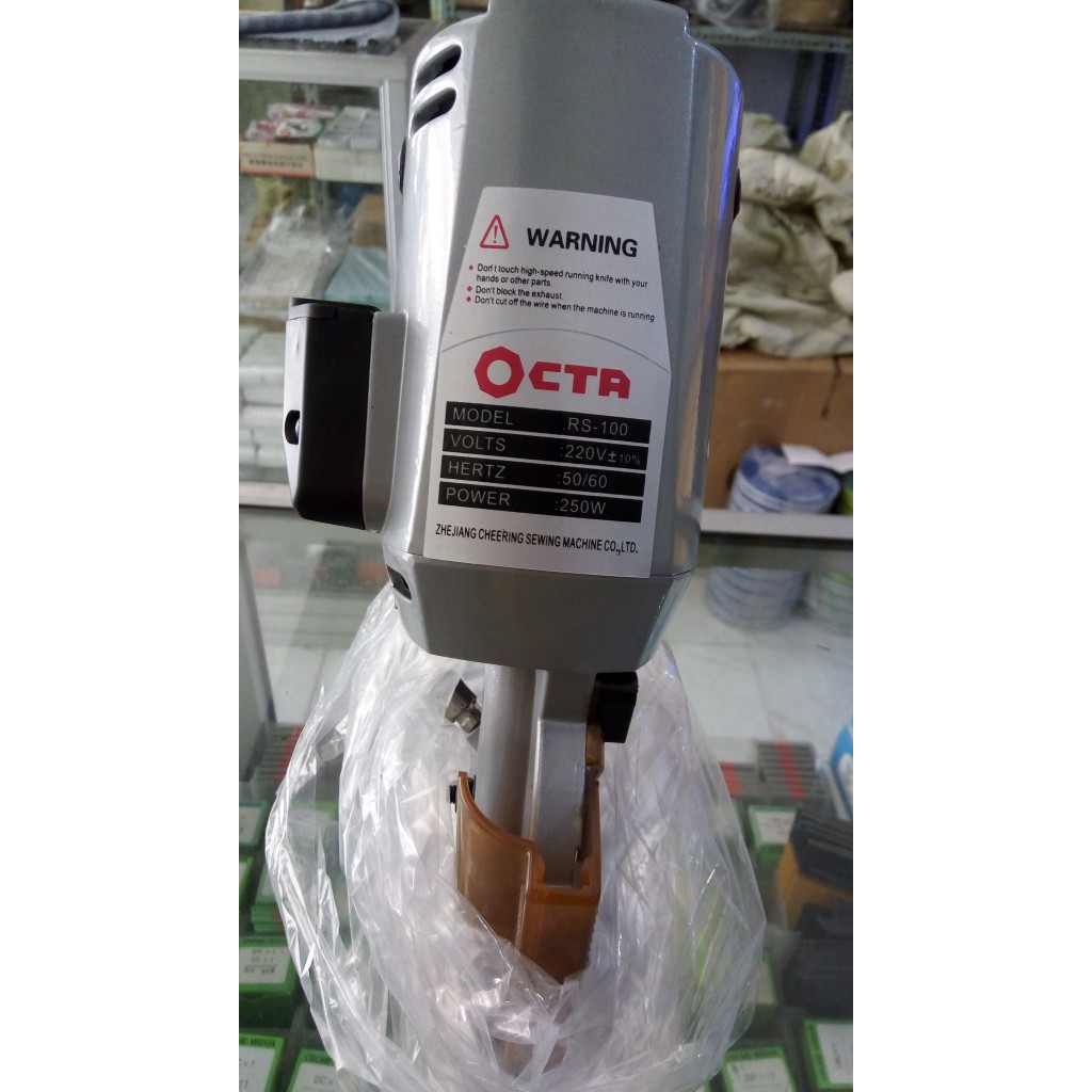 Mesin Potong Kain Merk Octa Rs 100