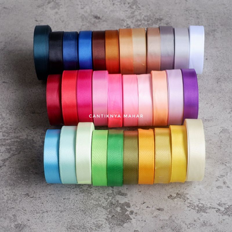 

WARNA LENGKAP PITA SATIN 3/4 = 2 CM. 1 ROLL 20 - 25 YARD