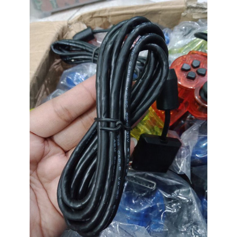 Stik ps2 op ori pabrik warna transparan kabel hitam serat