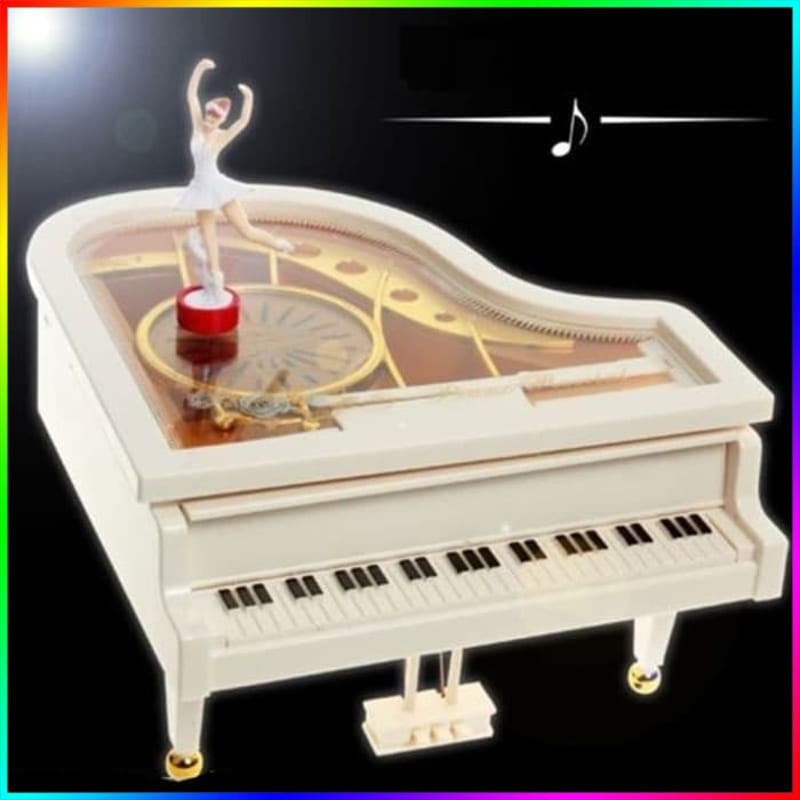 

kotak musik piano