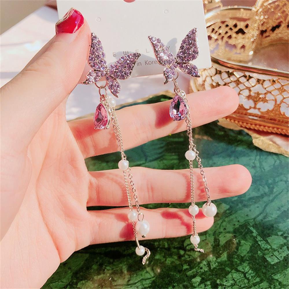 Anting Rantai Panjang Menjuntai Desain Nanas Butterfly Aksen Mutiara Shiny Warna Ungu Silver Untuk Wanita