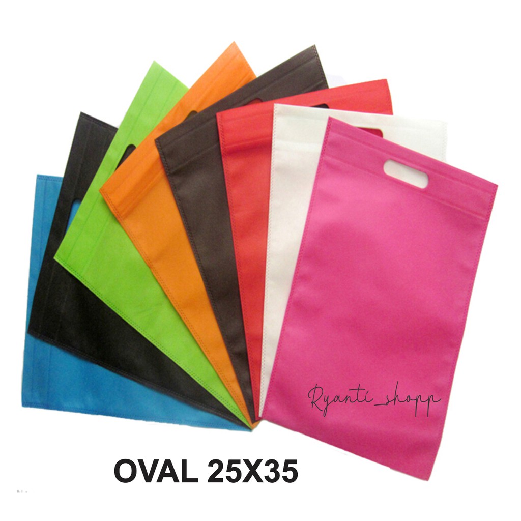 Tas Spunbond 75gsm model Plong/Oval uk25x35 cm / d cut /  spunbond / Plong / kain / press / kantong / Totebag / goodie / souvenir