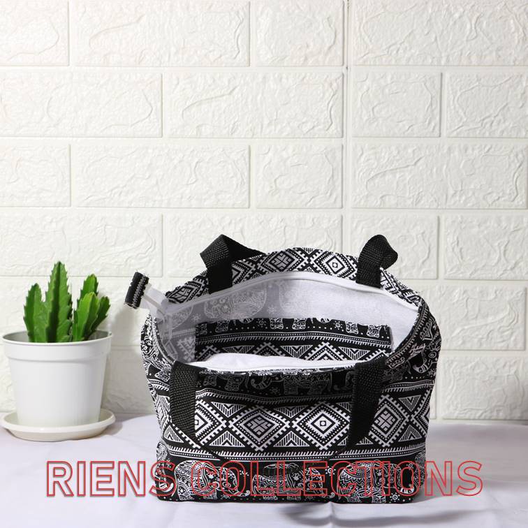 RIENS COLLECTIONS. HANDBAG KANVAS KECIL MOTIF GAJAH LATAR HITAM. TAS KANVAS JOGJA