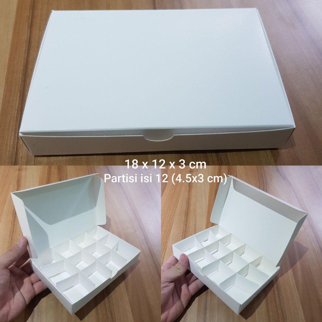 

Dus Putih uk. 18 x 12 x 3 cm dengan partisi, utk mochi, macaroon, dll (HARGA UNTUK 10 PCS DUS)