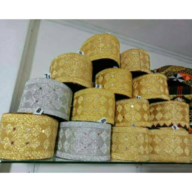 Peci tapis mata kibau