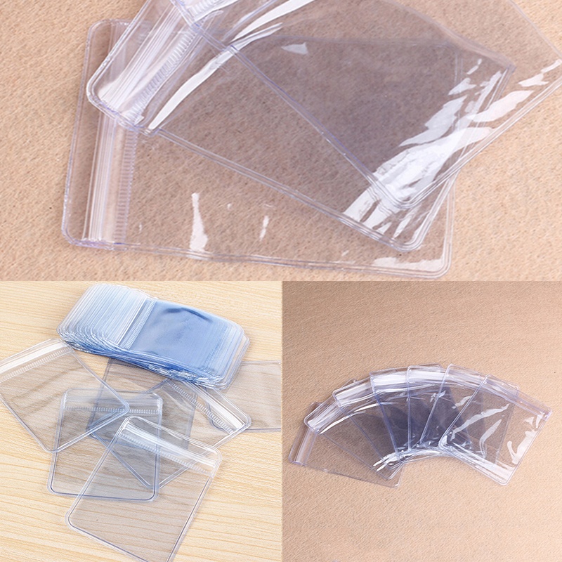 100pcs Tas Dompet Penyimpanan Koin Bahan Plastik PVC Bening