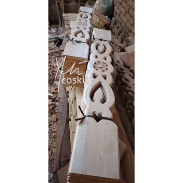 Pagar kayu motif ukiran kembang