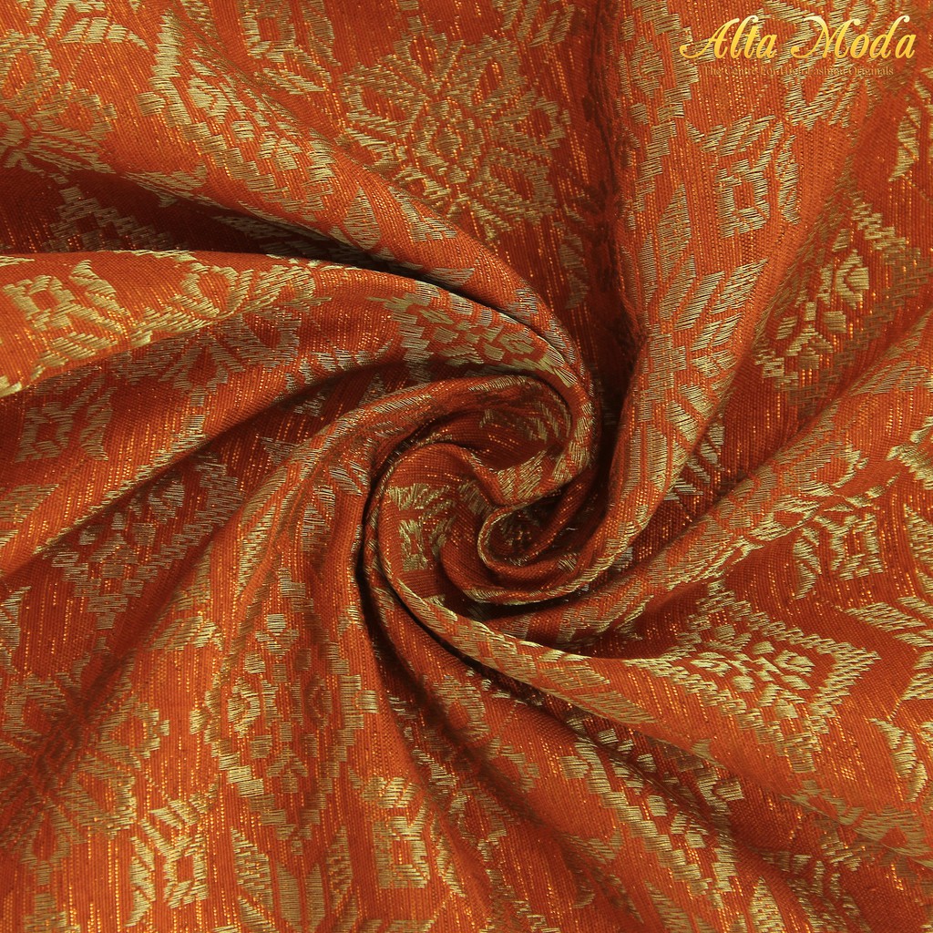 

Alta Moda Songket Motif Palembang Orange Tua Mix Benang Gold (1M)