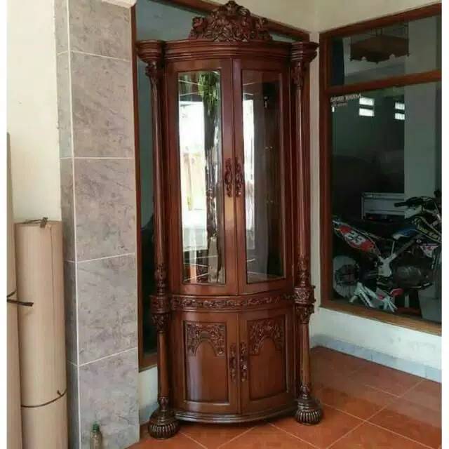 Lemari pajangan sudut kayu jati furniture Jepara