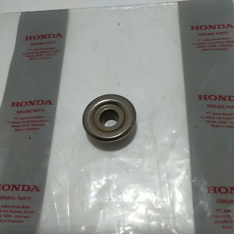 Retainer  topi sim klep Honda GENIO dijamin original