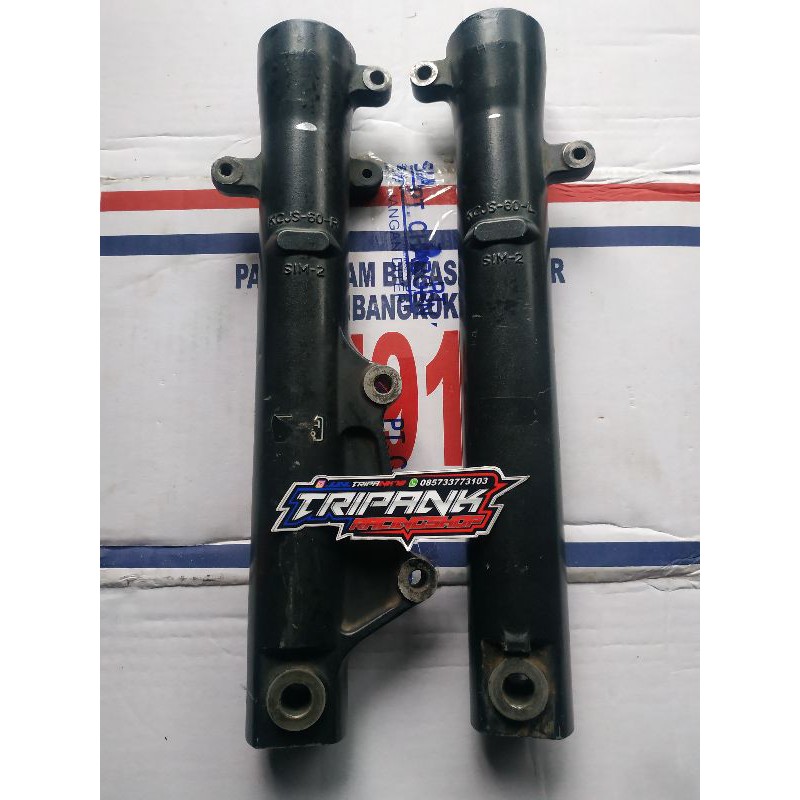 bottom shock tabung shock depan tiger revo