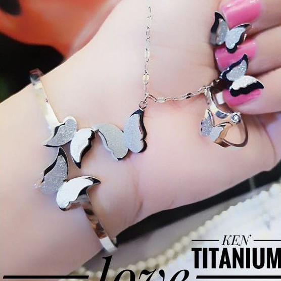 Titanium set perhiasan model kupu 1006m