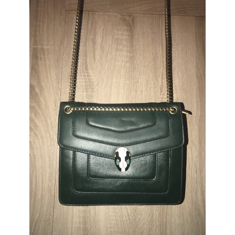 tas hijau snake head