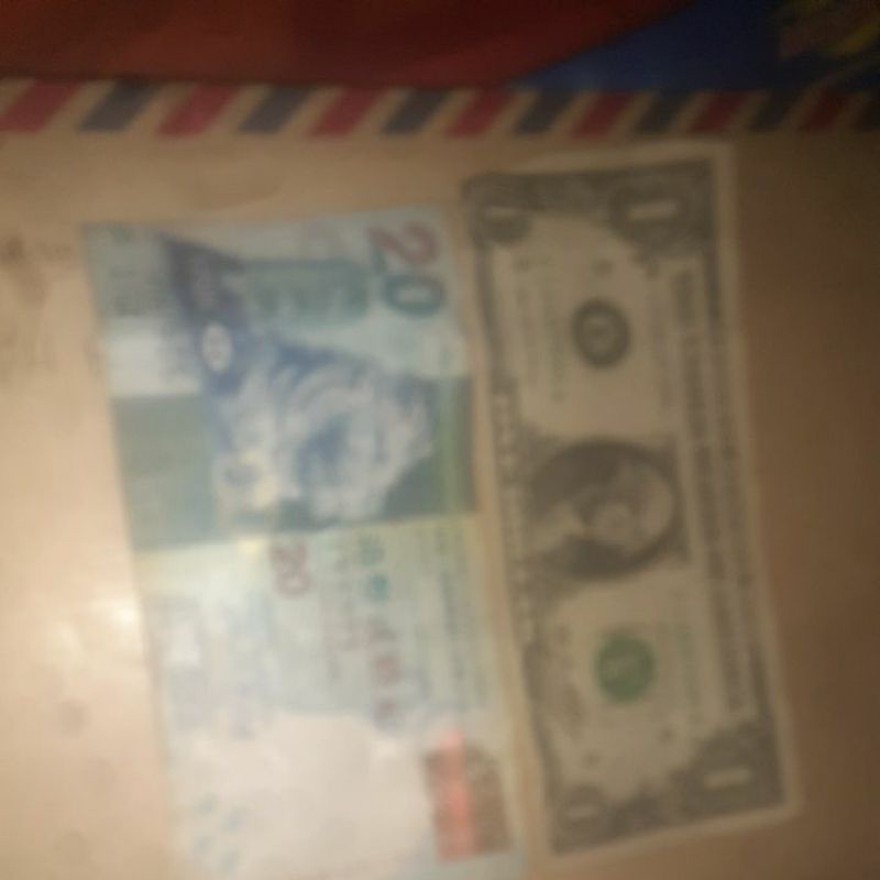 20 dollar hongkong dan 1 dollar usa