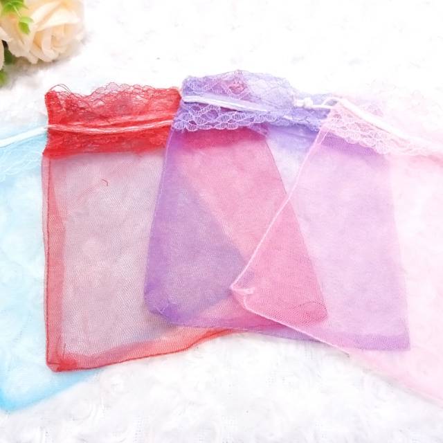 sarung tile sarung souvenir / kantong souvenir /tile serut