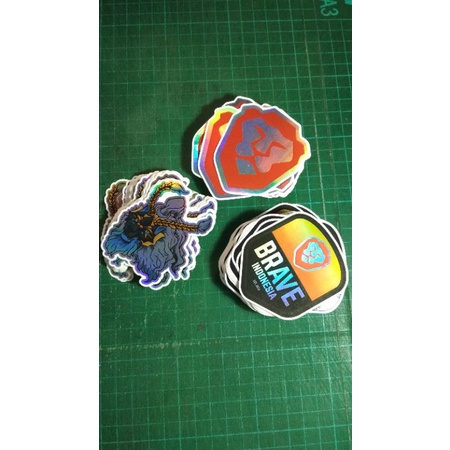 

Stiker Vinyl Hologram A3 die cut dengan laminasi