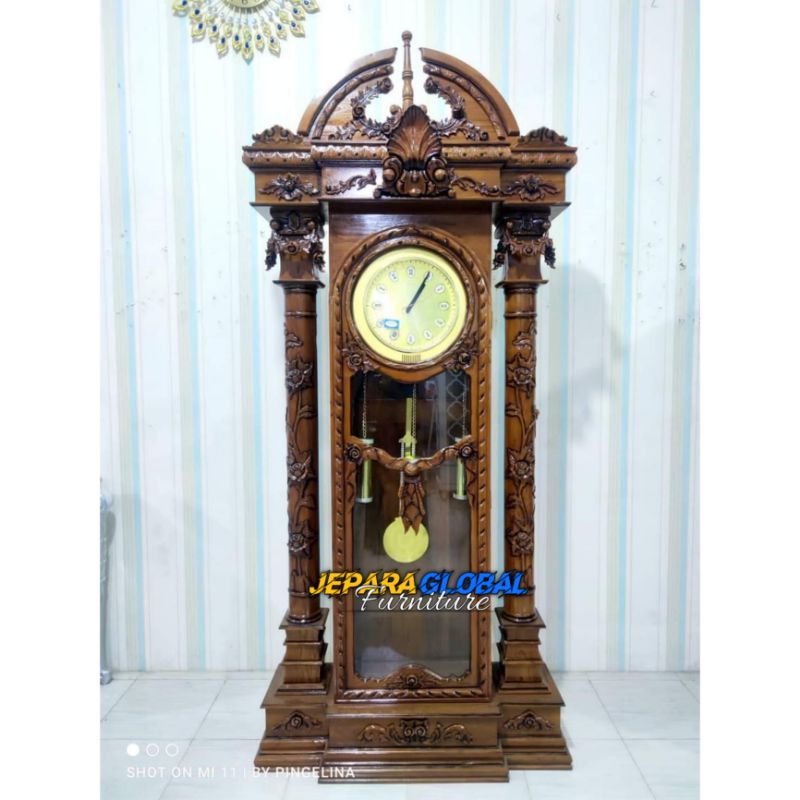 Lemari Jam hias ukir jati brawijaya (lemari ukir jati,rak hias jati,lemari pajangan jati )