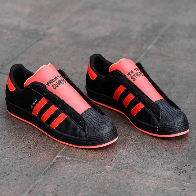 SEPATU ADIDAS SUPERSTAR LACELESS FROM THE COURT TO THE STREET FULL BLACK ORANGE