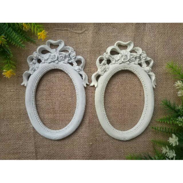 

Frame resin oval pita besar