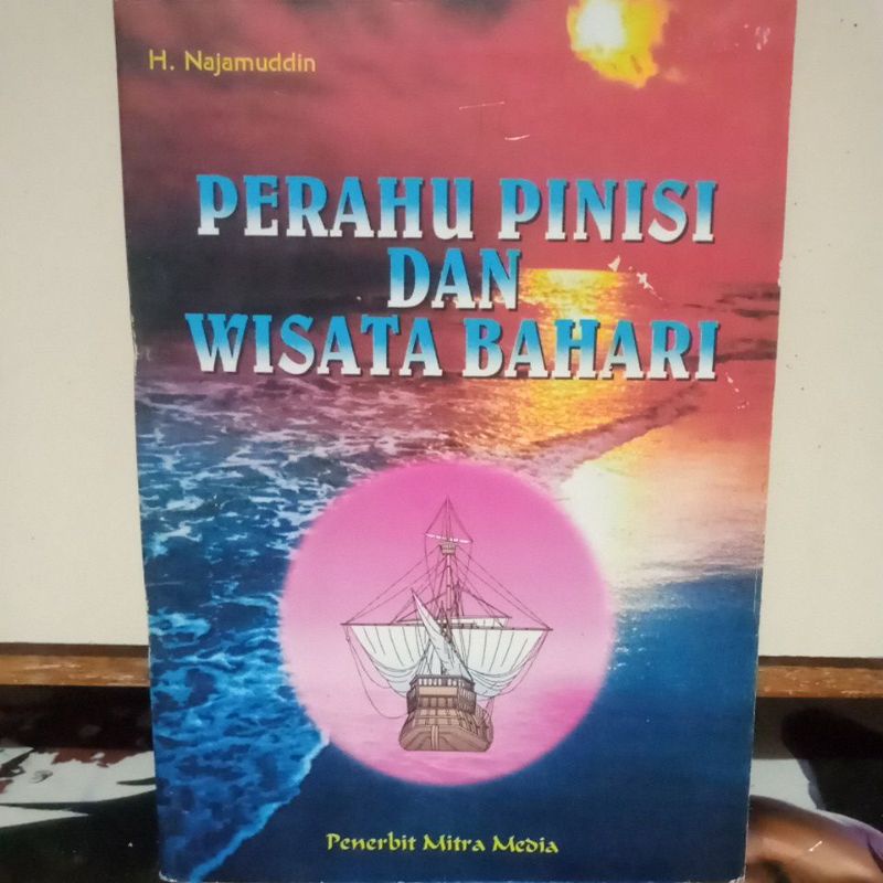Buku Wisata - PERAHU PINISI DAN WISATA BAHARI
