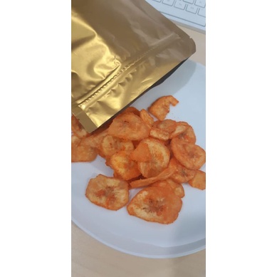 

KERIPIK PISANG KEPOK PEDAS MANIS 100GRAM GURIH DAN RENYAH