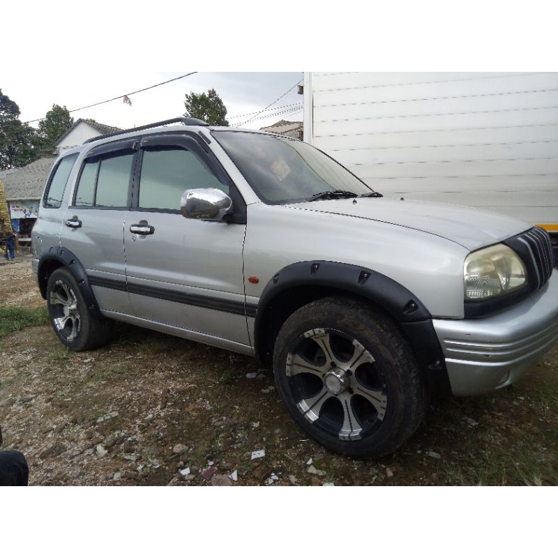over fender escudo 1.6 2.0
