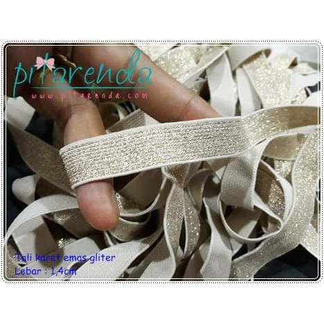 

Jual Tkr-59 : Tali Karet Emas Gliter 1,4 Cm Murah